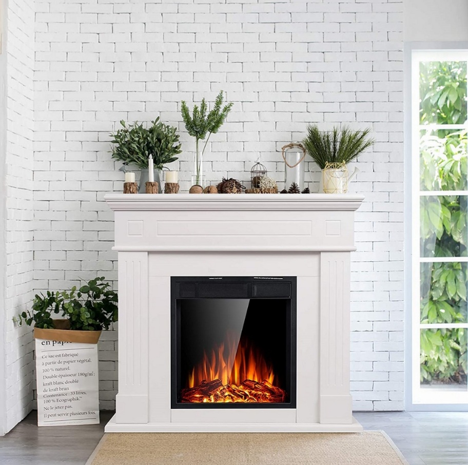 Include An Electric Fireplace With Mantel And Surround